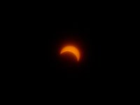 People gather in front of the UMass Dartmouth observatory to view the partial solar eclipse that swept over the area.   [ PETER PEREIRA/THE STANDARD-TIMES/SCMG ]